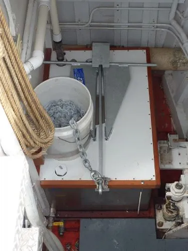 Slide: The Image of 1968 Monk 56 Flushdeck boat interior with ropes, bucket, and mechanical equipment. - 35