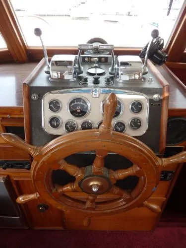 Slide: The Image of 1968 Monk 56 Flushdeck helm with wooden wheel and vintage gauges. - 41