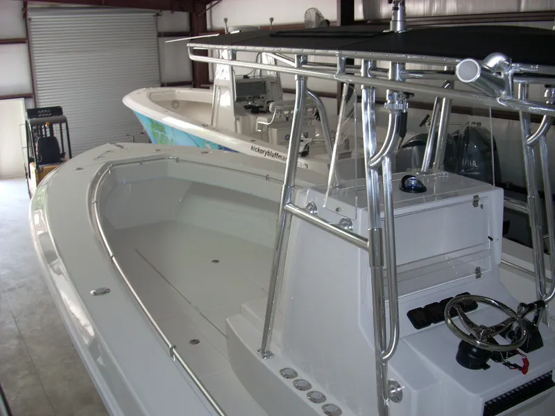 Slide: The Image of 2024 Contender 35 ST STEP HULL boat in storage facility. - 7