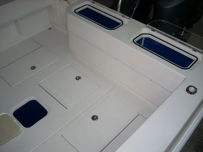 Slide: The Image of 2024 Contender 35 ST STEP HULL boat deck with storage compartments. - 8