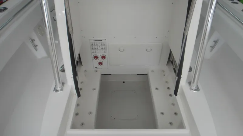 Slide: The Image of 2024 Contender 32 ST boat interior with open storage compartment. - 11