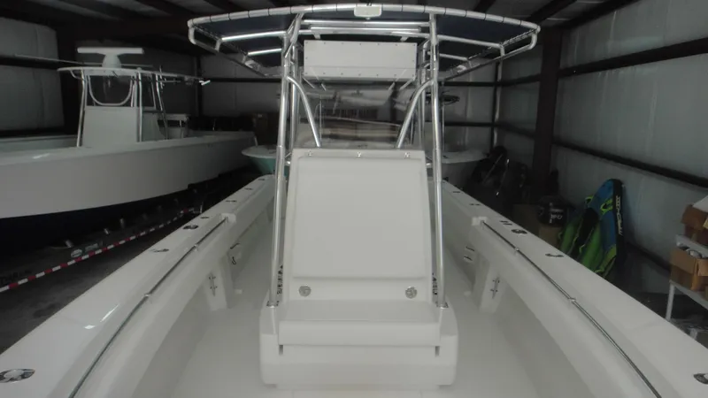 Slide: The Image of 2024 Contender 32 ST center console boat in storage. - 12