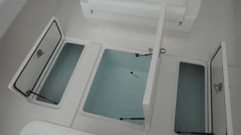 Slide: The Image of 2024 Contender 32 ST boat storage compartments and livewells. - 14