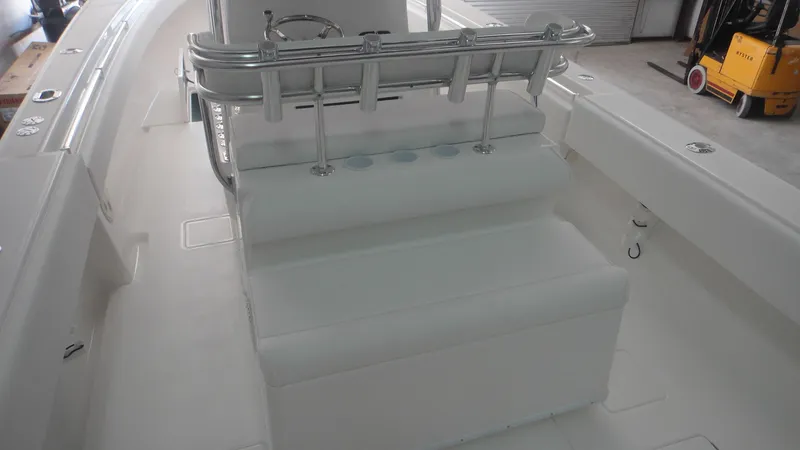 Slide: The Image of 2024 Contender 32 ST boat interior with seating and rod holders. - 16