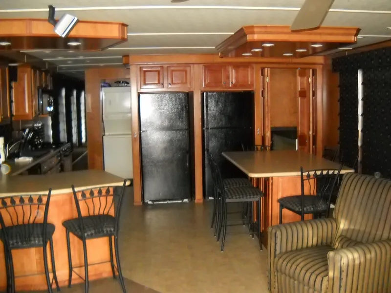 Slide: The Image of Spacious kitchen and dining area in 2006 Sharpe Makena Share 5 houseboat. - 3