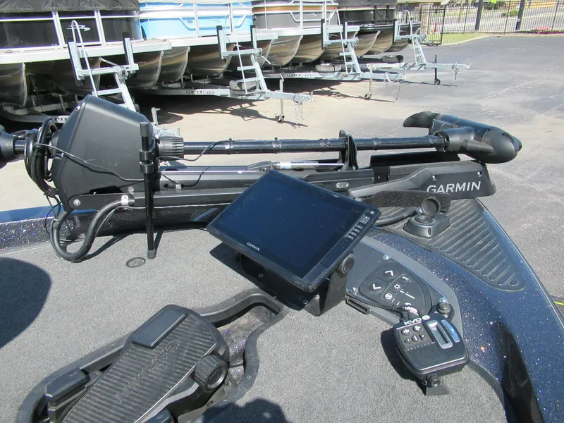 Slide: The Image of 2012 Ranger Z-521 DC boat with Garmin electronics and trolling motor on deck. - 2