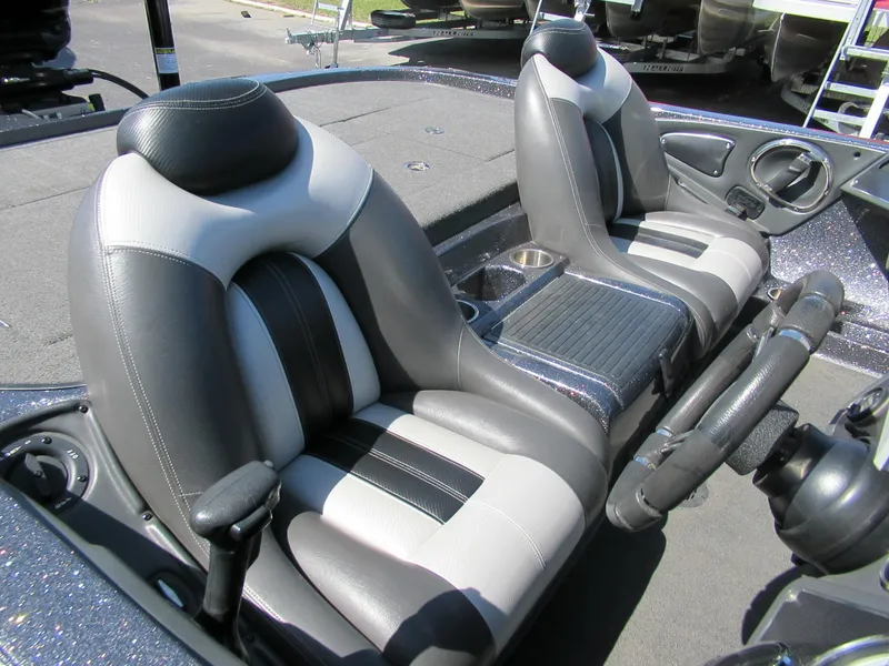 Slide: The Image of 2012 Ranger Z-521 DC boat interior with dual seats and steering wheel. - 4