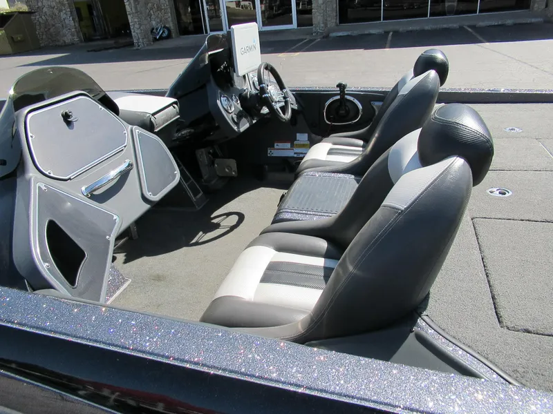 Slide: The Image of 2012 Ranger Z-521 DC boat interior with dual seats and steering console. - 6