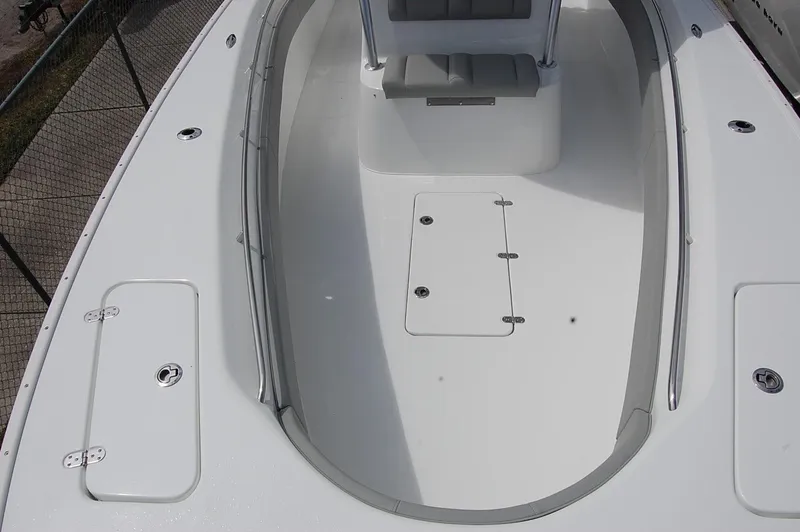 Slide: The Image of 2023 Cape Horn 31T boat deck with storage compartments and seating. - 10