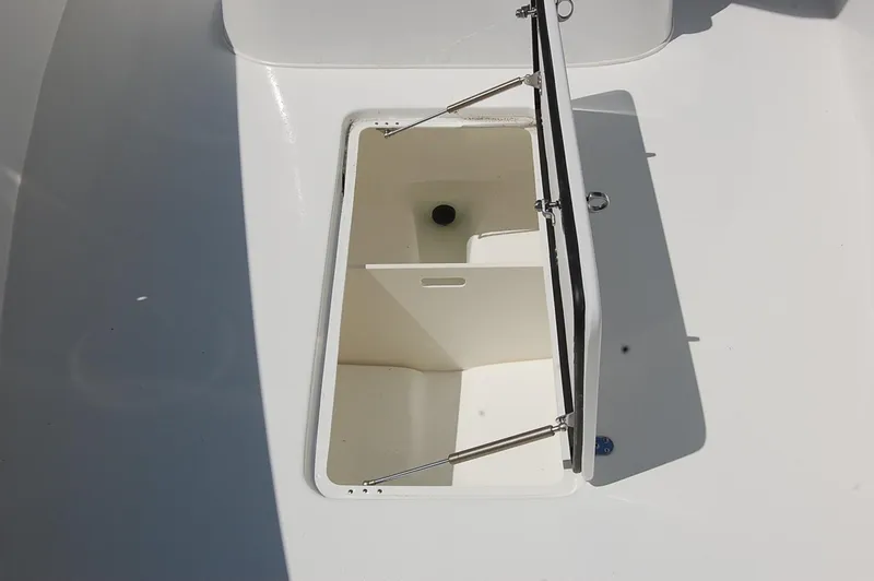 Slide: The Image of Open storage compartment on 2023 Cape Horn 31T boat. - 12