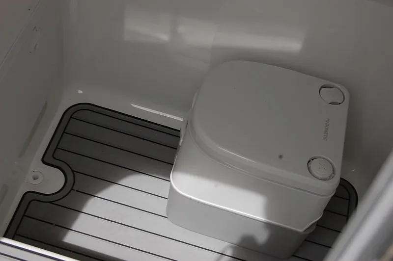 Slide: The Image of 2023 Cape Horn 31T boat interior with compact marine toilet. - 14