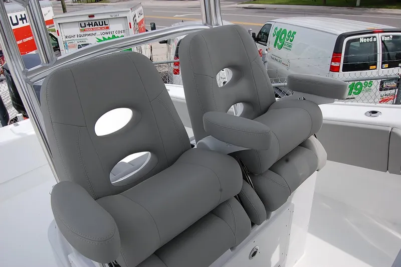 Slide: The Image of 2023 Cape Horn 31T boat with dual gray captain's chairs. - 5