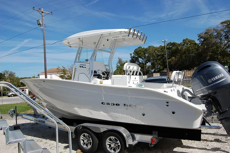 The Image of 2025 Cape Horn 27 XS boat on trailer with Yamaha outboard motor. - 0