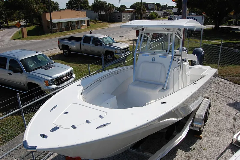 Slide: The Image of 2025 Cape Horn 27 XS boat on trailer in outdoor lot. - 2