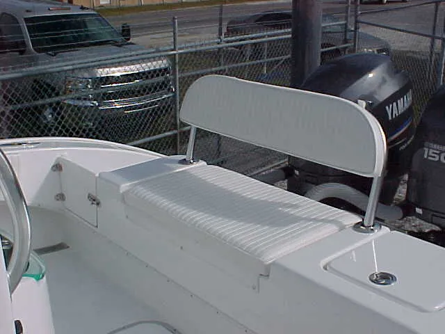 Slide: The Image of 2025 Cape Horn 27 XS boat with Yamaha outboard motors and white seating. - 6