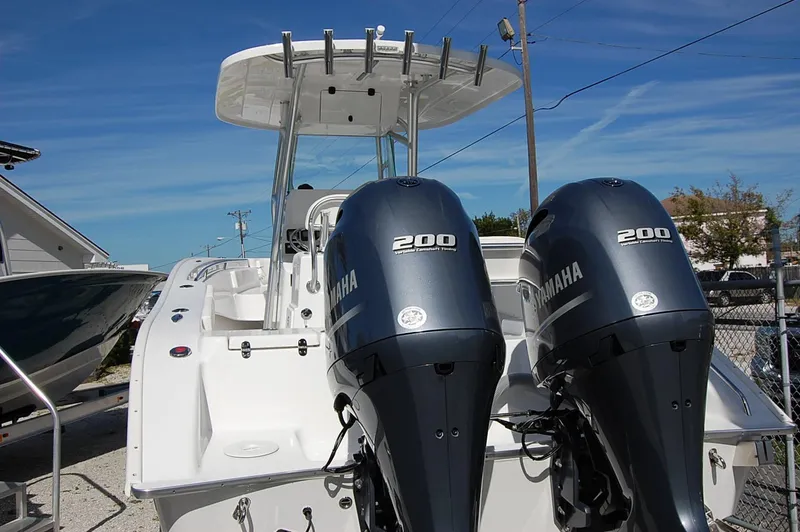 Slide: The Image of 2025 Cape Horn 27 XS boat with twin Yamaha 200 engines, rear view. - 3