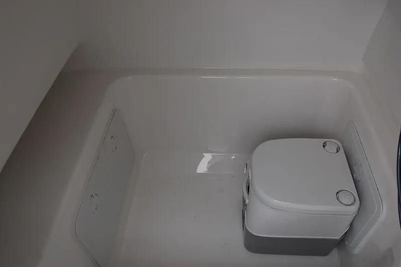 Slide: The Image of 2025 Cape Horn 27 XS boat interior with compact toilet. - 8