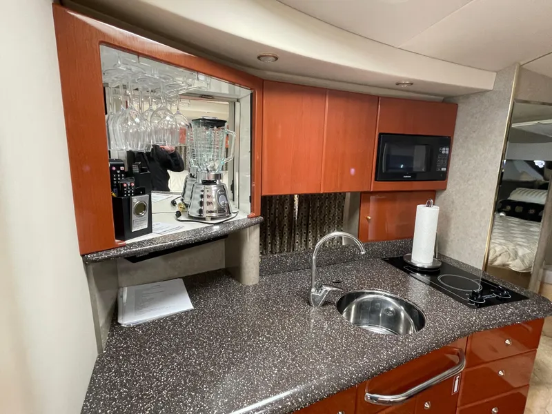 Slide: The Image of 2004 Formula 37 PC yacht kitchen with sink, microwave, and blender. - 7