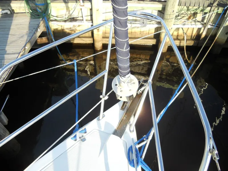 Slide: The Image of Bow of a 1999 Catalina 320 sailboat in harbor. - 18