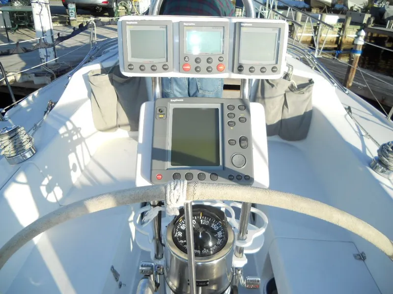 Slide: The Image of Cockpit of a 1999 Catalina 320 yacht with navigation instruments. - 19