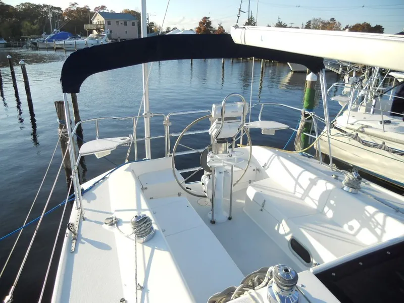 Slide: The Image of Cockpit of a 1999 Catalina 320 yacht in harbor. - 21