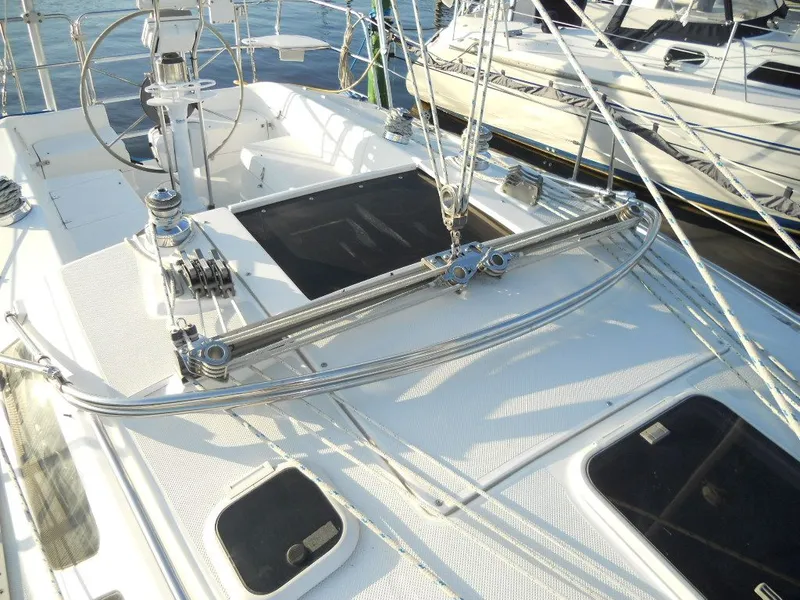 Slide: The Image of Deck of a 1999 Catalina 320 sailboat in harbor. - 23