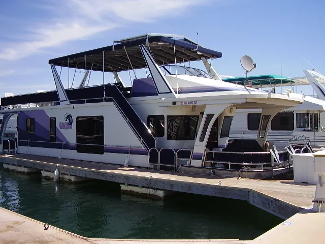 Slide: The Image of 1998 Jamestowner Widebody Multi Owner Houseboat docked at marina. - 1
