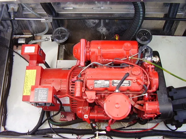 Slide: The Image of Red engine in a 2005 Starlite Multi Owner Houseboat, detailed view. - 12