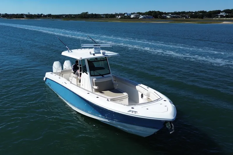 Slide: The Image of Boston Whaler 330 Outrage 2026 - 2