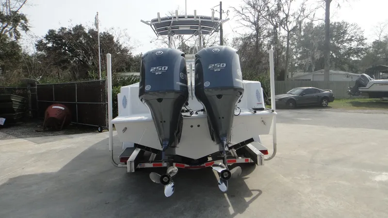 Slide: The Image of 2024 Contender 28T boat with twin 250 HP outboard engines. - 6