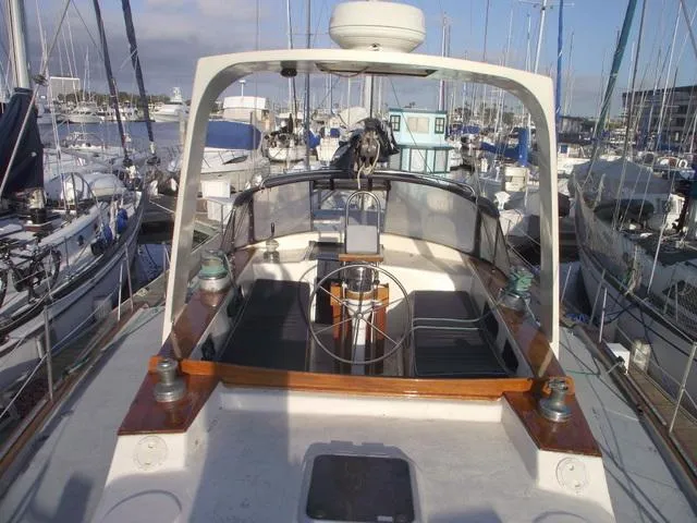 Slide: The Image of 1984 Irwin Center Cockpit yacht in a busy marina. - 11