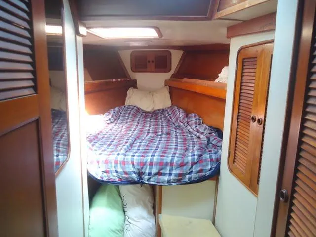 Slide: The Image of Interior of a 1984 Irwin Center Cockpit yacht with cozy bed. - 15