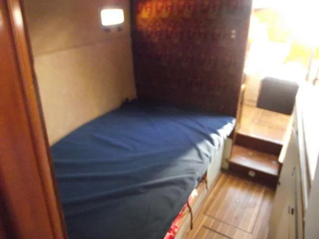 Slide: The Image of Interior of a 1984 Irwin Center Cockpit yacht with sleeping area. - 22