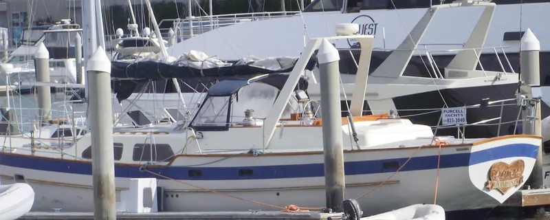 Slide: The Image of 1984 Irwin Center Cockpit sailboat docked in marina. - 5