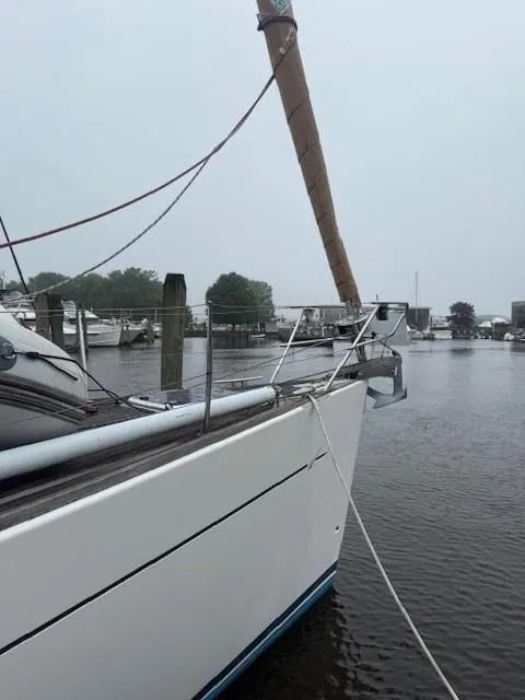 Slide: The Image of Sailboat docked in marina, Wauquiez Centurion 45s, 2003 model, overcast day. - 11