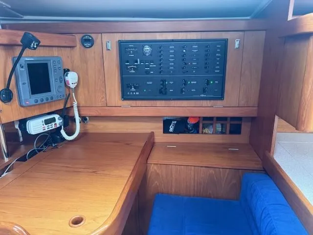 Slide: The Image of Interior of 2003 Wauquiez Centurion 45s yacht with navigation equipment and control panel. - 31