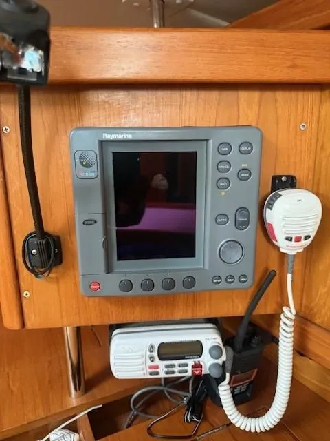 Slide: The Image of Raymarine navigation system on 2003 Wauquiez Centurion 45s yacht, featuring control panel and radio. - 34