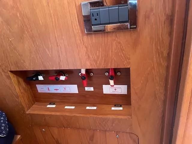 Slide: The Image of Control panel on 2003 Wauquiez Centurion 45s yacht, featuring switches and labels. - 36