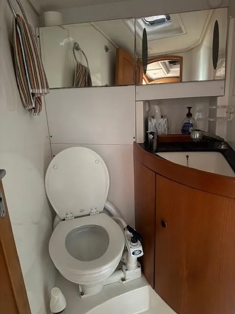 Slide: The Image of Bathroom interior of 2003 Wauquiez Centurion 45s yacht with toilet and sink. - 42