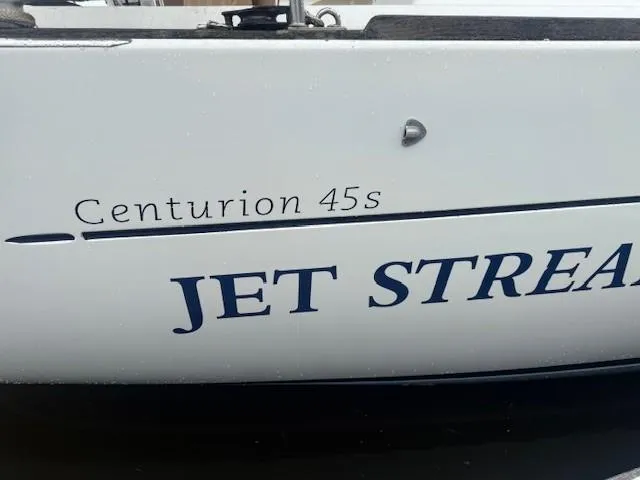Slide: The Image of Wauquiez Centurion 45s sailboat, 2003 model, named "Jet Stream" with visible branding. - 7