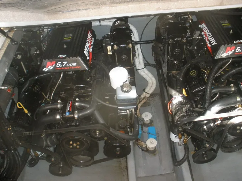 Slide: The Image of Engine room of 2000 Sea Ray Sundancer 310 with twin Mercury engines. - 18