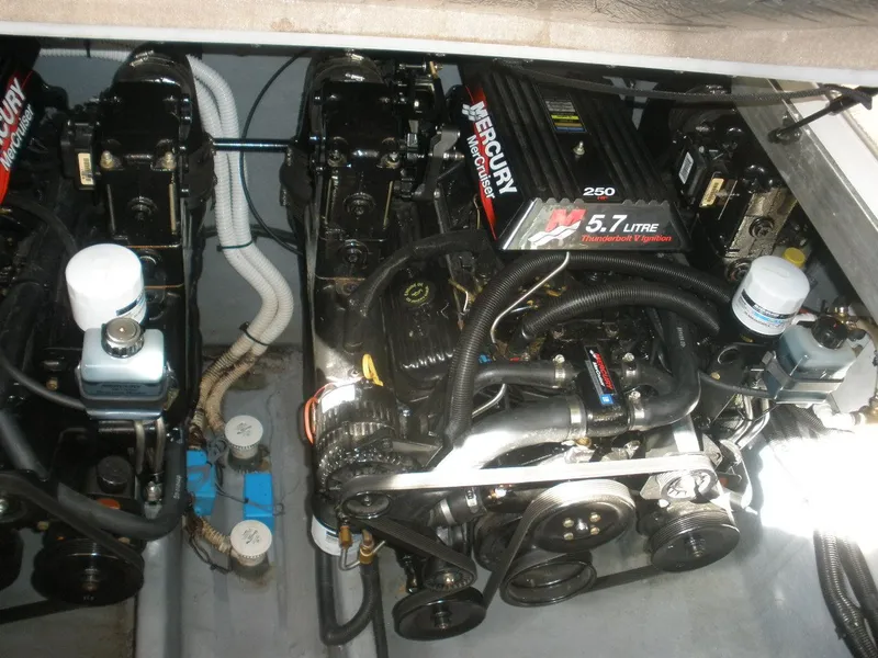 Slide: The Image of Engine room of 2000 Sea Ray Sundancer 310 with Mercury 5.7-liter engines. - 19