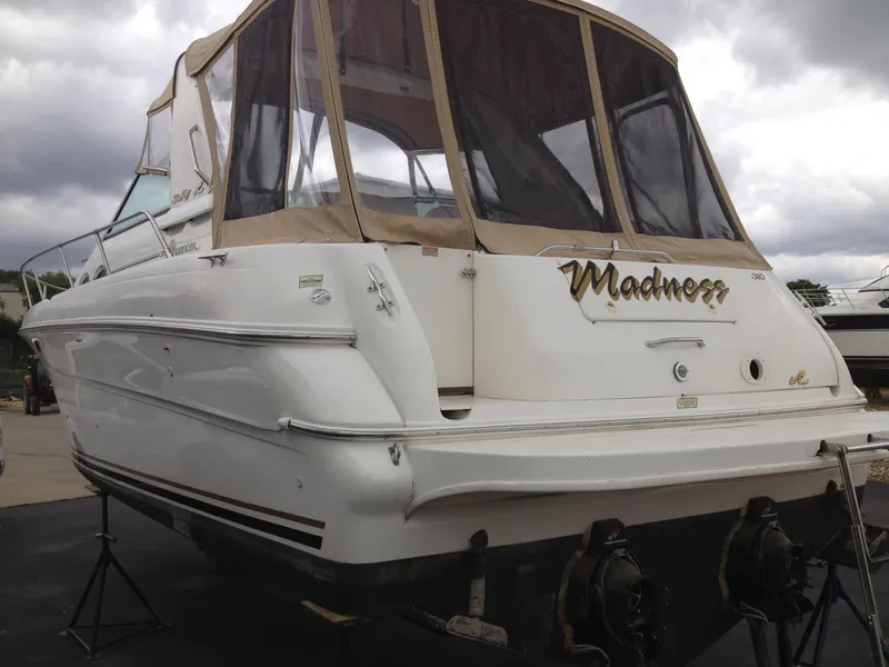 Slide: The Image of 2000 Sea Ray Sundancer 310 boat named Madness. - 3