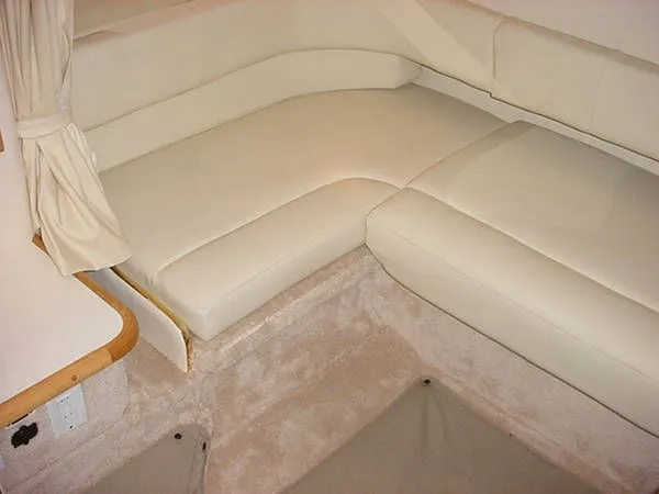 Slide: The Image of Interior of 2000 Sea Ray Sundancer 310 with beige upholstery. - 8