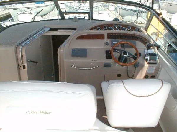 Slide: The Image of 2000 Sea Ray Sundancer 310 boat interior cockpit view - 9