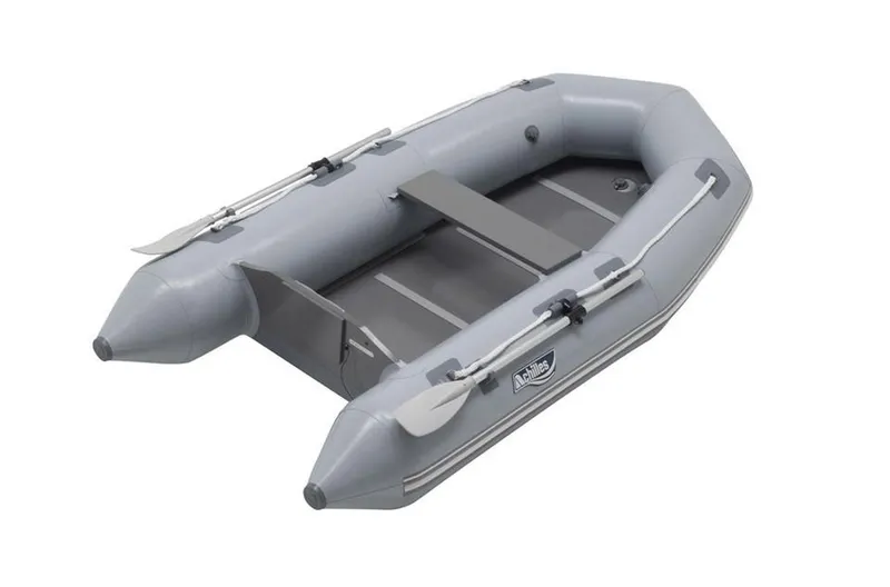 The Image of 2024 Achilles LEX-77 inflatable boat, gray, with oars and bench seat. - 1