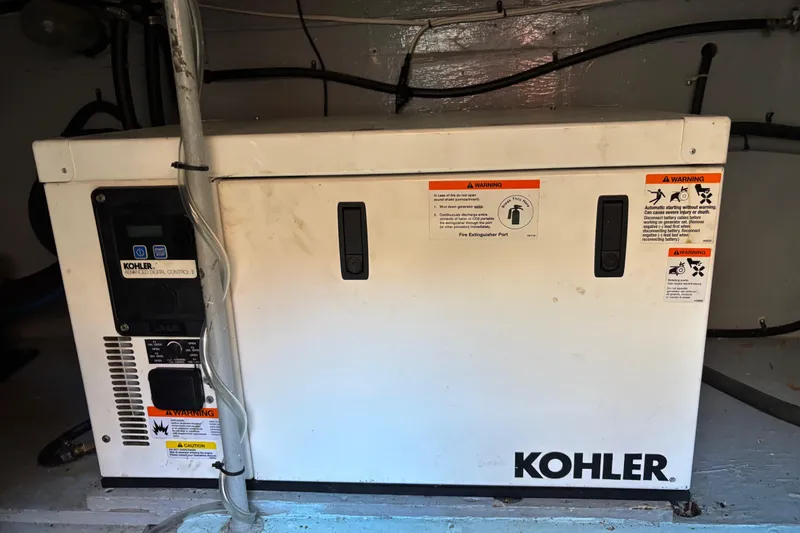 Slide: The Image of Kohler generator in 1985 Egg Harbor 37 Tournament boat engine room. - 19