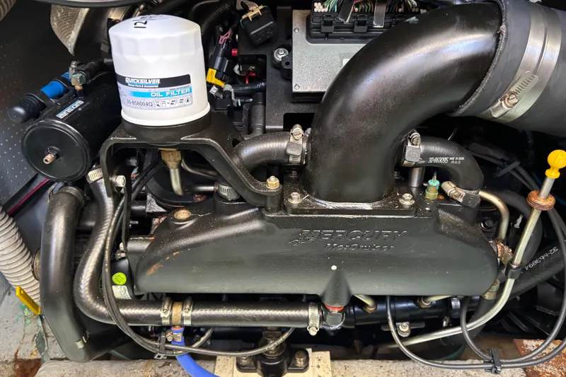 Slide: The Image of Engine of a 1985 Egg Harbor 37 Tournament boat with Quicksilver oil filter. - 22