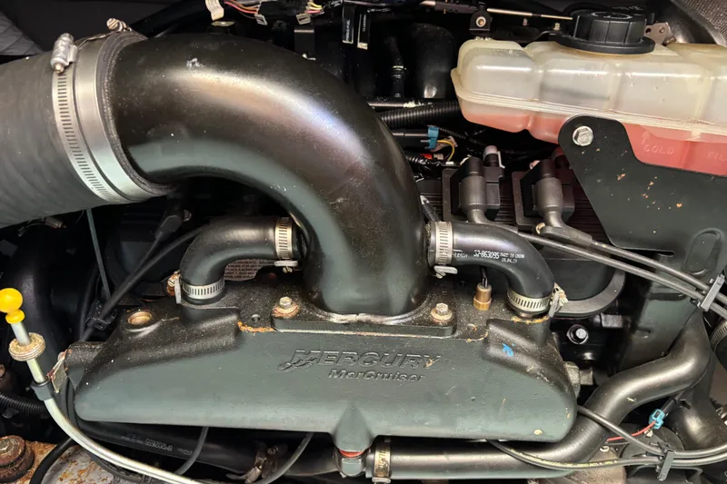 Slide: The Image of Engine of 1985 Egg Harbor 37 Tournament boat, featuring Mercury MerCruiser components. - 23