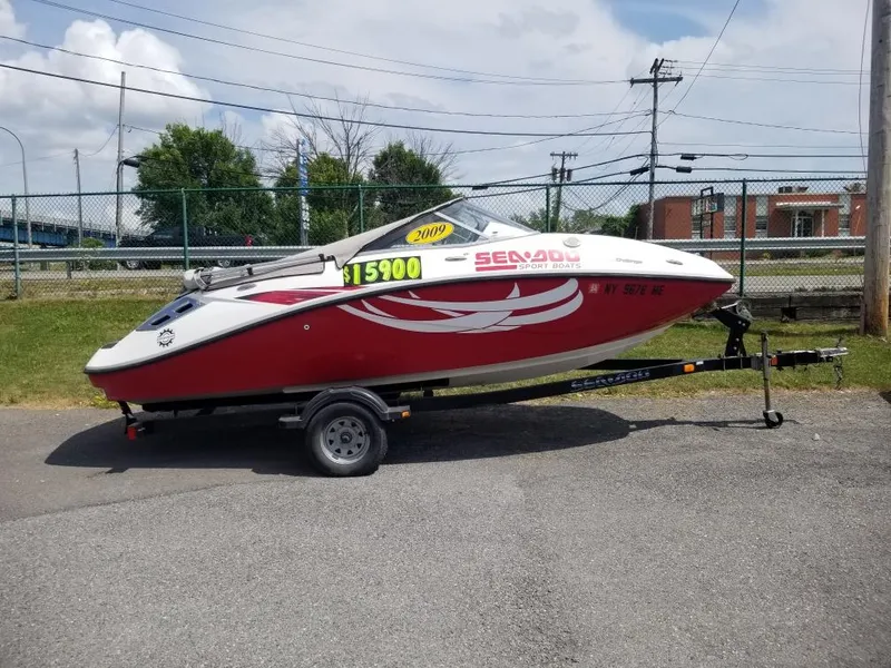 The Image of 2009 Sea-Doo 180 Challenger boat on trailer, red and white, priced at $15,900. - 0